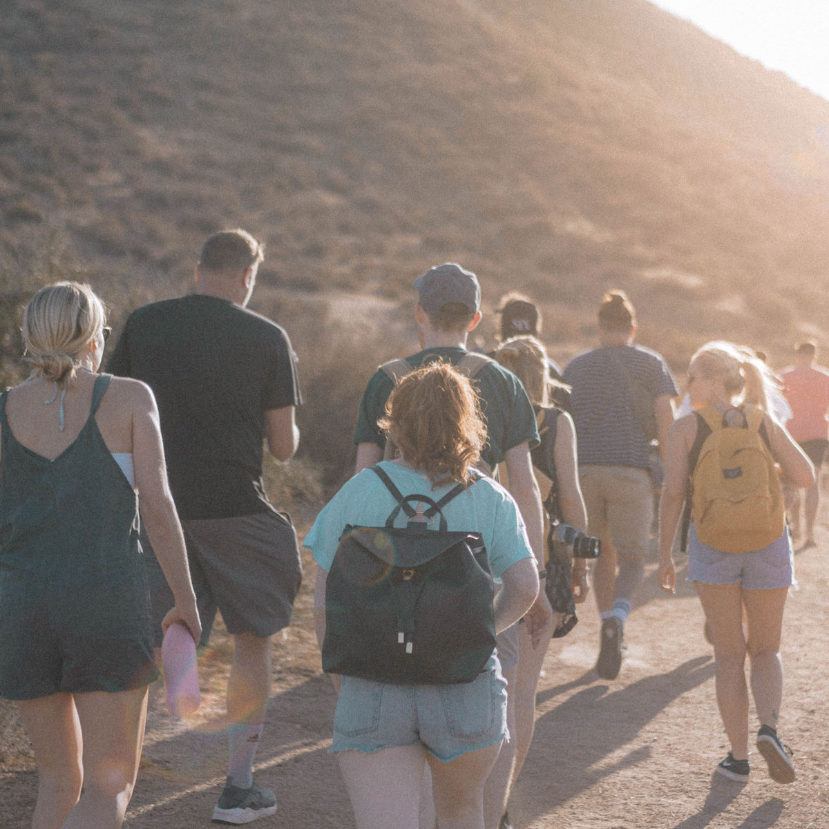 Large group of people going on a mountainous hike